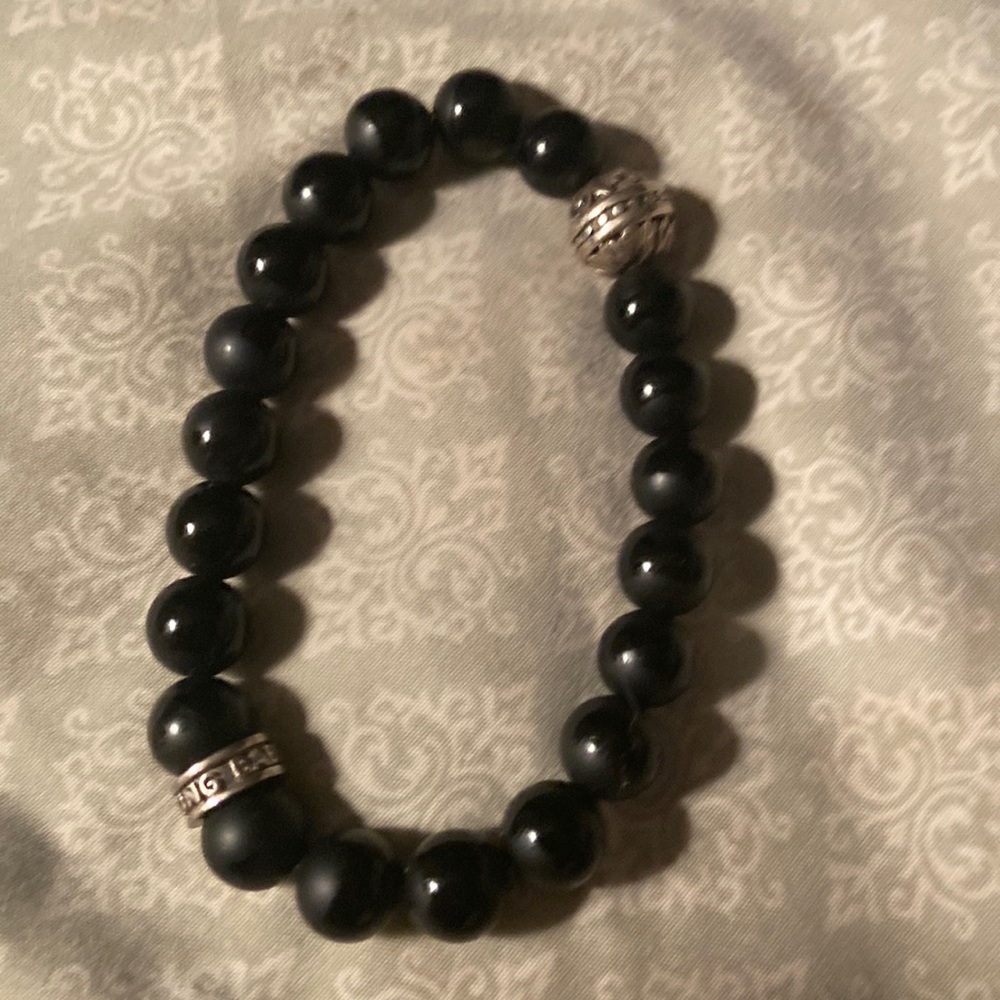 This is a mens King Baby USA bracelet. It’s 925 It’s a stretch bracelet.